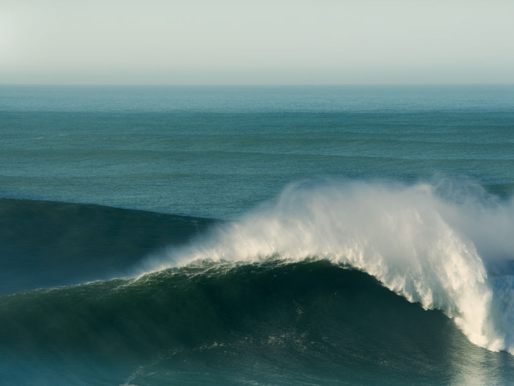 Christine Flynn, Nazaré Wave 2, 2023, (photograph with mixed media; 60x40in). Courtesy of the artist and Dianna Witte Gallery