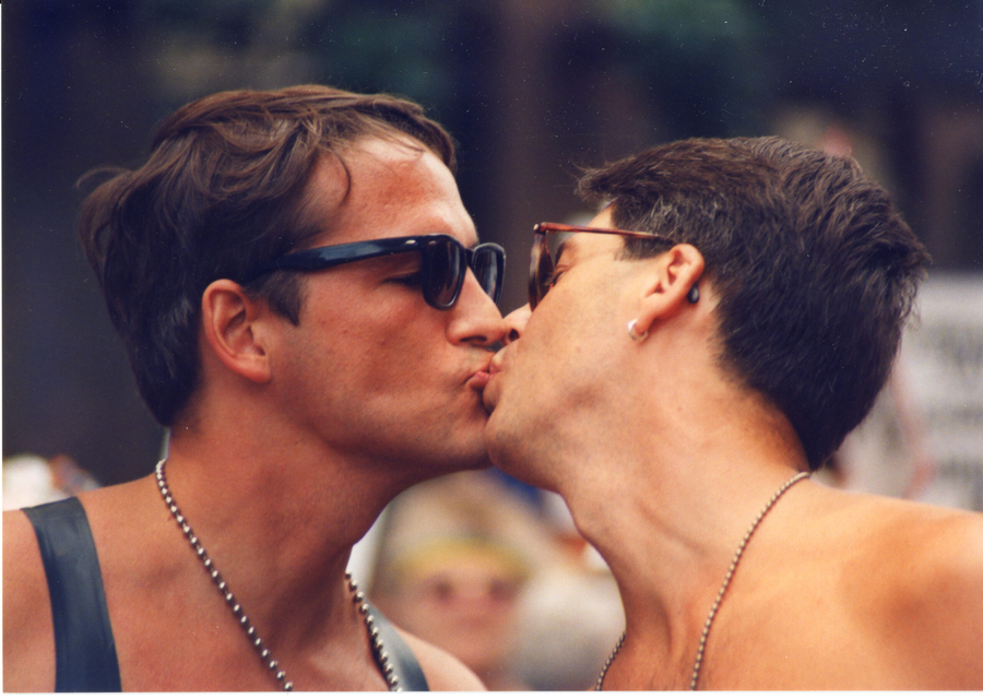 Unidentified photographer, [Couple kissing at Toronto Pride], 2009. Courtesy of The ArQuives and The Magenta Foundation