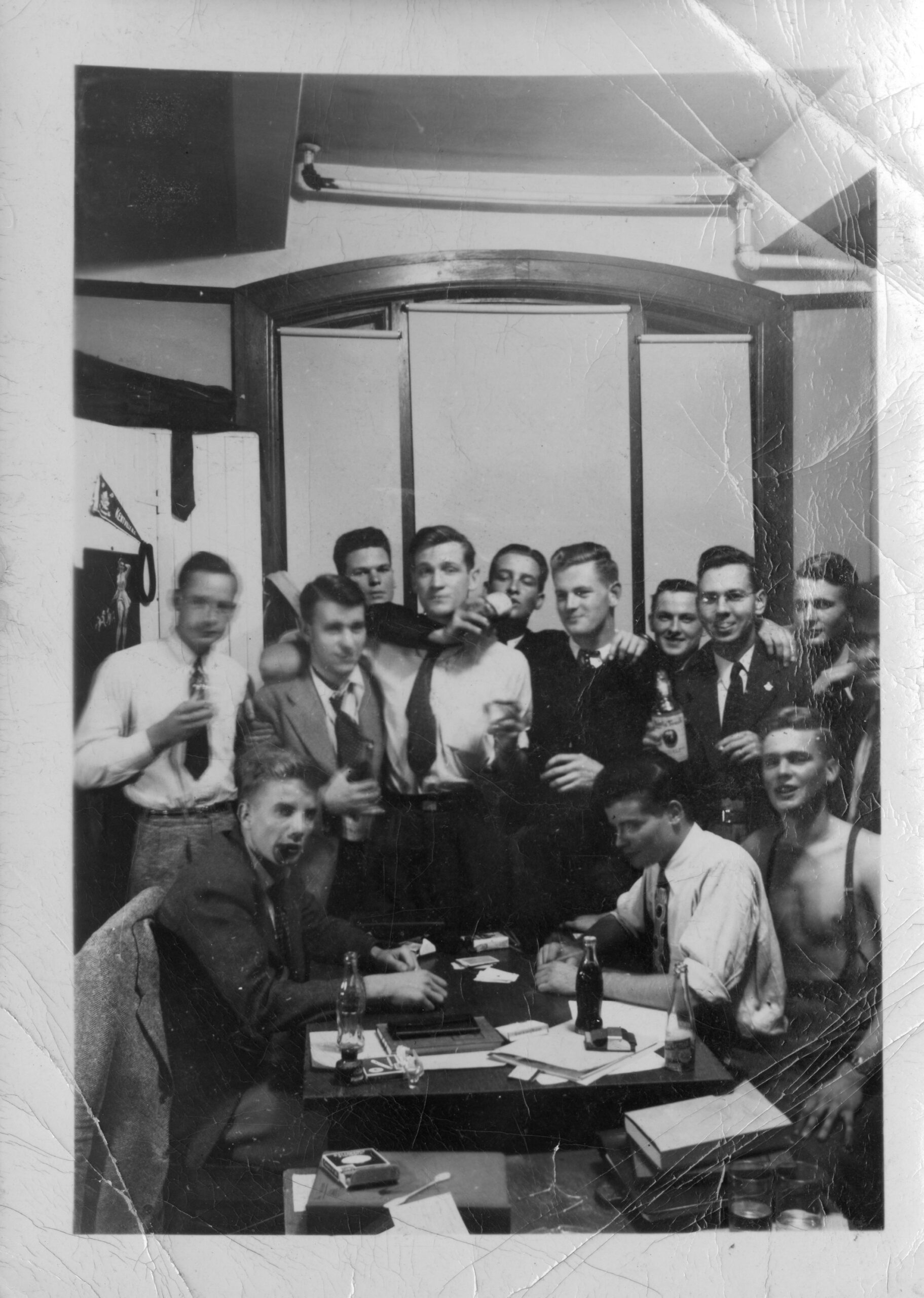 Unidentified photographer, [Men at a party], c. 1947, (gelatin silver print). Courtesy of Toronto Metropolitan University Libraries