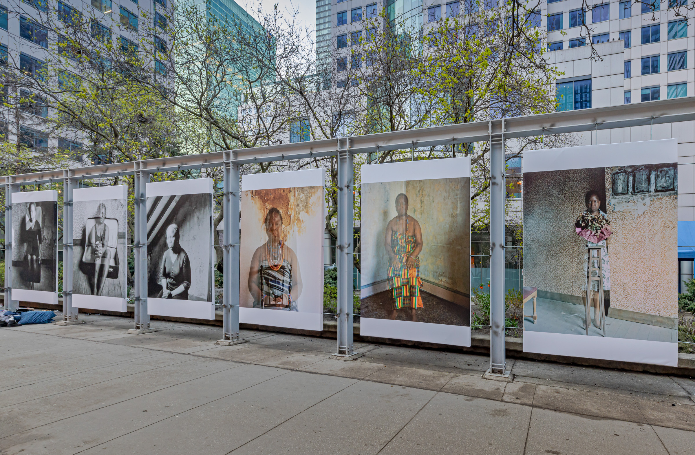     Hélène Amouzou, Writing Without Words: The Autoportraits of Hélène Amouzou, installation view, Metro Hall along King St W, Toronto, 2023. Courtesy of the artist and CONTACT. Photo: Toni Hafkenscheid

