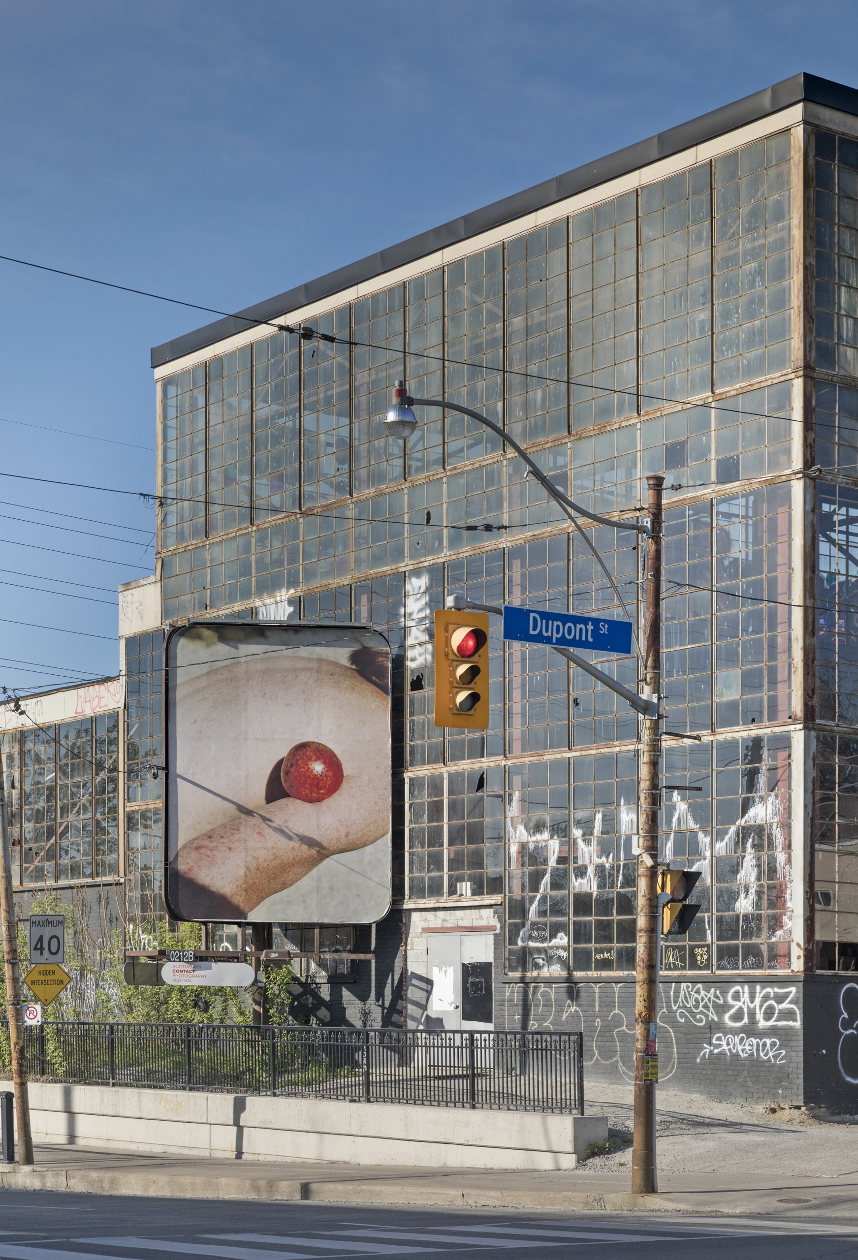     Charlie Engman, Mom, 2018. Installation on billboards at Dovercourt Rd and Dupont St, Toronto. Photo by Toni Hafkenscheid. 

