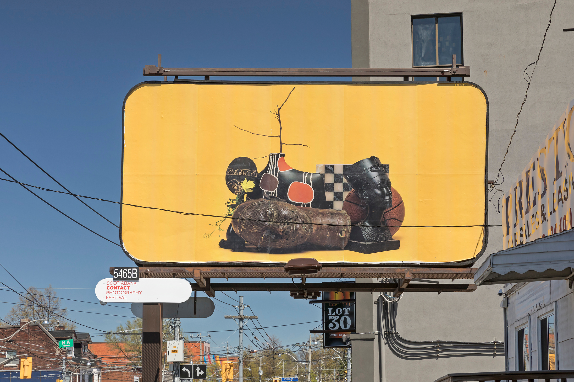     Awol Erizku, Say Less, 2018. Billboard installation on Lansdowne Avenue at Dundas Street W and College Street, Toronto. Photo by Toni Hafkenscheid. 

