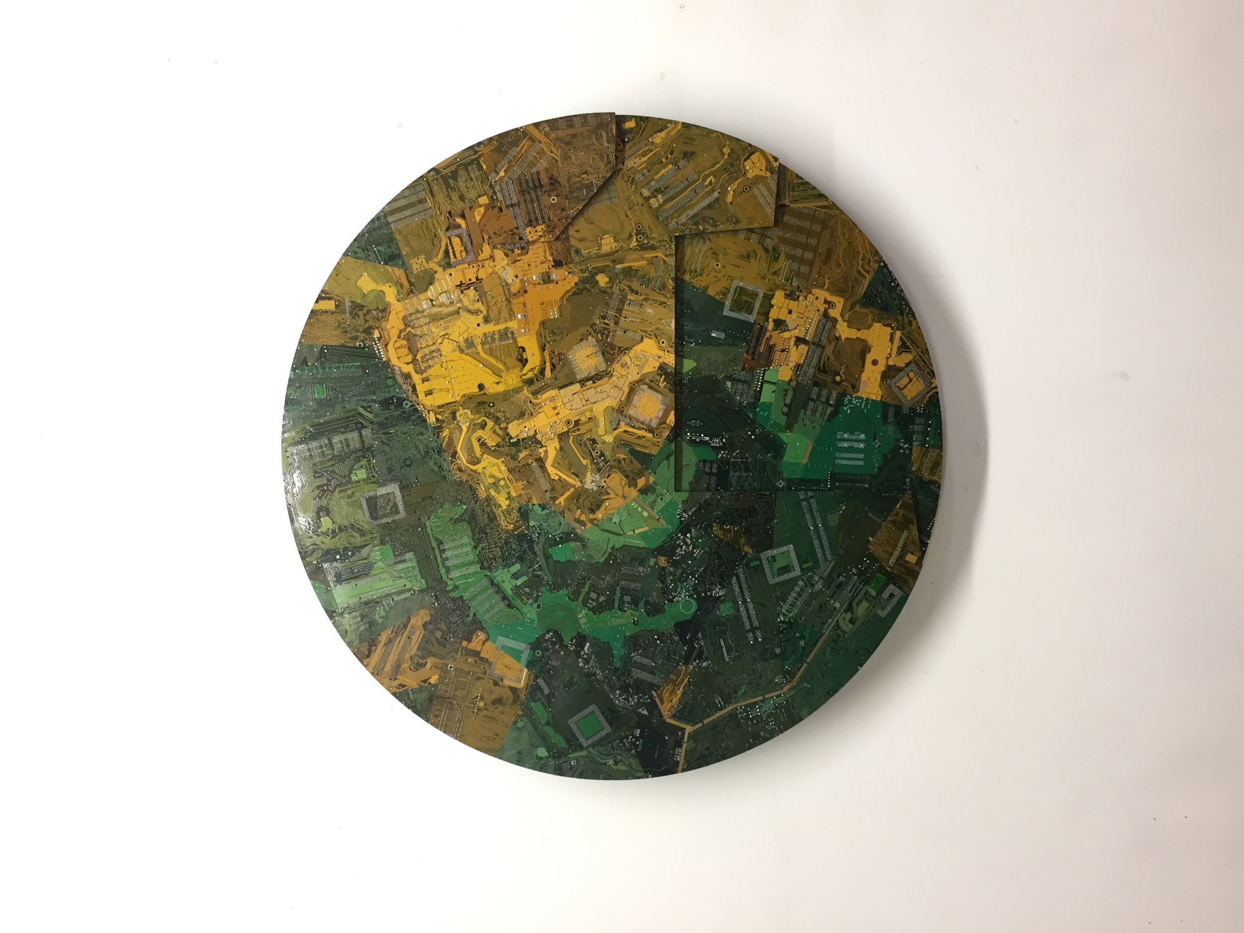    Wally Dion, Butterfly, 37 ¼ inches diameter, recycled circuitboards, plywood, nails, 2018 .

