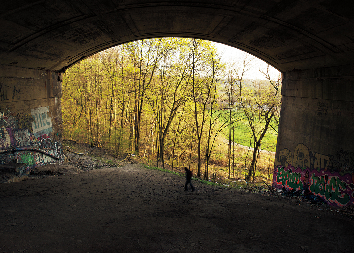     Robert Burley, Homeless man beneath the Prince Edward Viaduct, 2013. Courtesy of the Stephen Bulger Gallery. 

