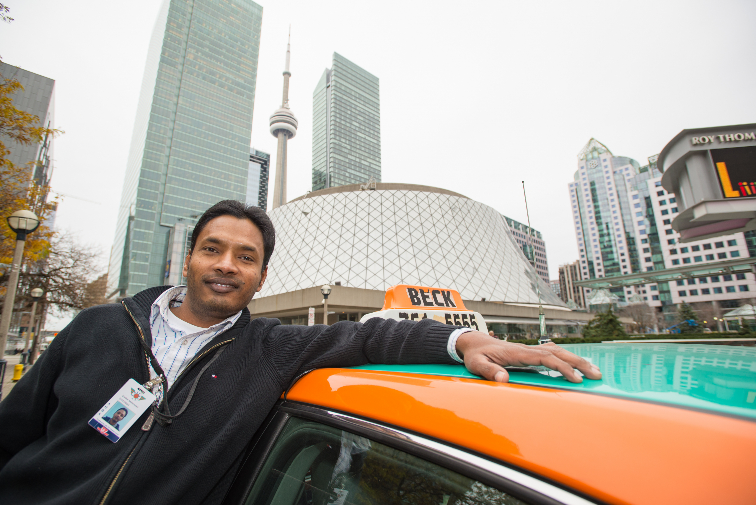     Henry VanderSpek, Qhadeer, on Simcoe Street beside Roy Thomson Hall., 2013

