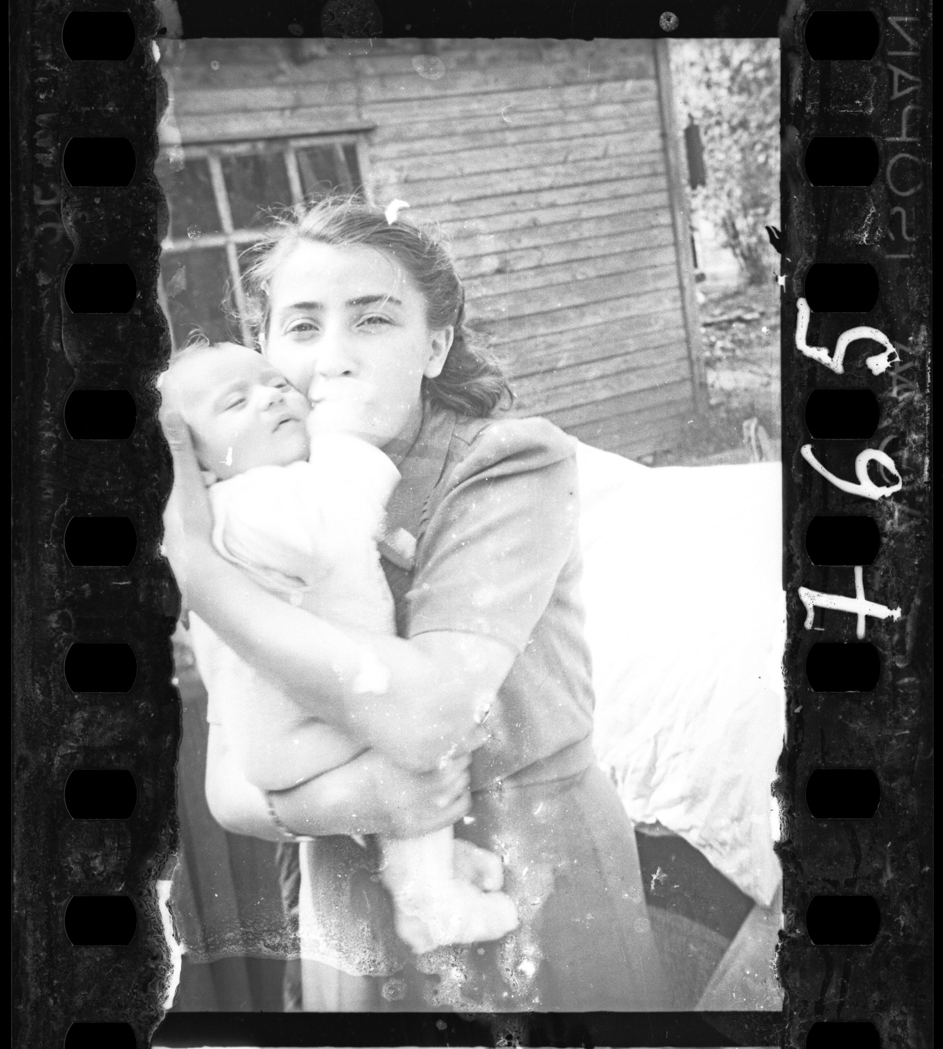     Henryk Ross, Lodz ghetto: Woman with her child (Ghetto policemenâ€™s family), 1940-42 Art Gallery of Ontario Gift from Archive of Modern Conflict, 2007 Â© Art Gallery of Ontario

