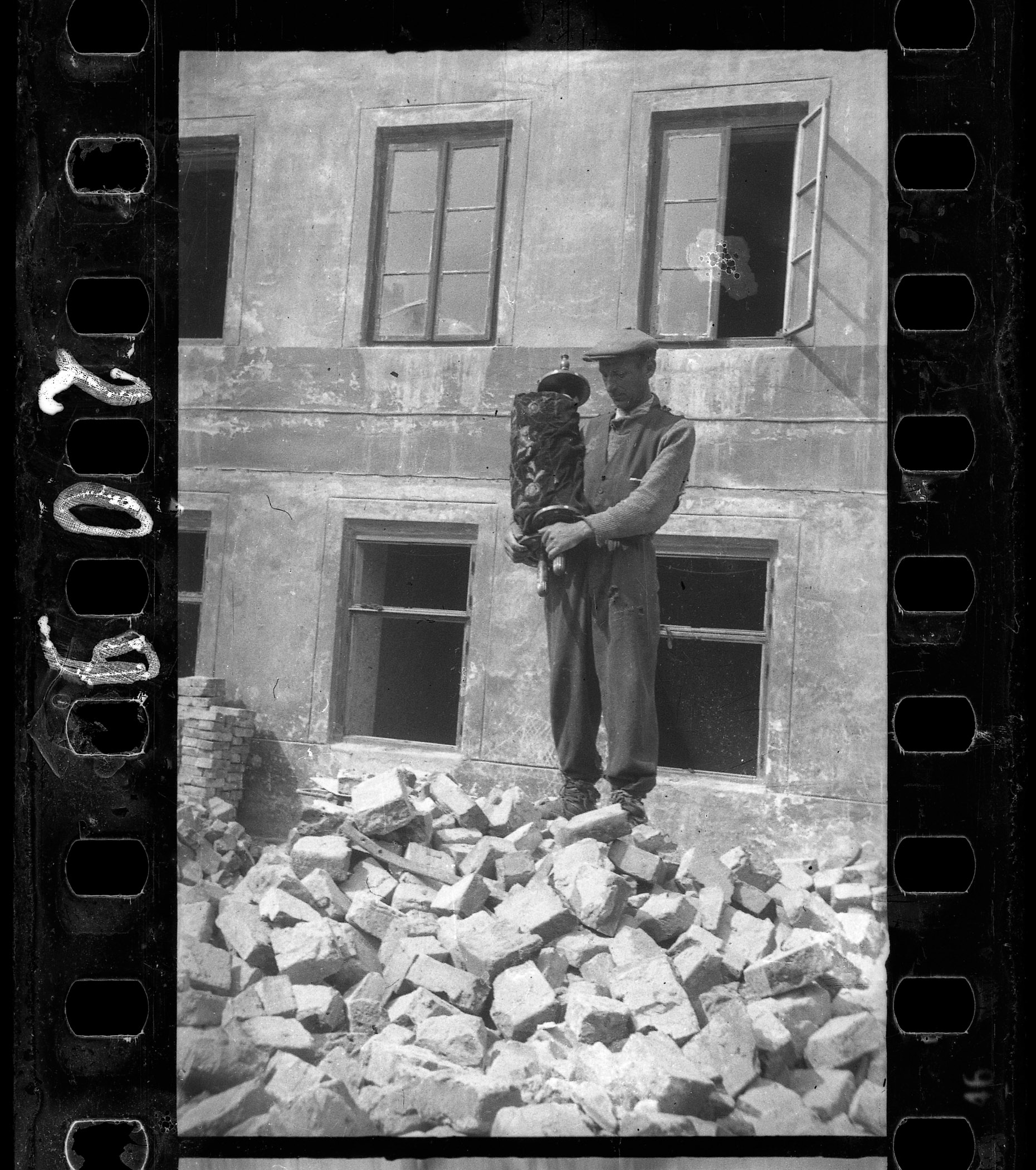     Henryk Ross, Lodz ghetto: Man who saved the Torah from the rubble of the synagogue on Wolborska street (destroyed by Germans 1939), 1940 Art Gallery of Ontario, Gift from Archive of Modern Conflict, 2007. Â© Art Gallery of Ontario

