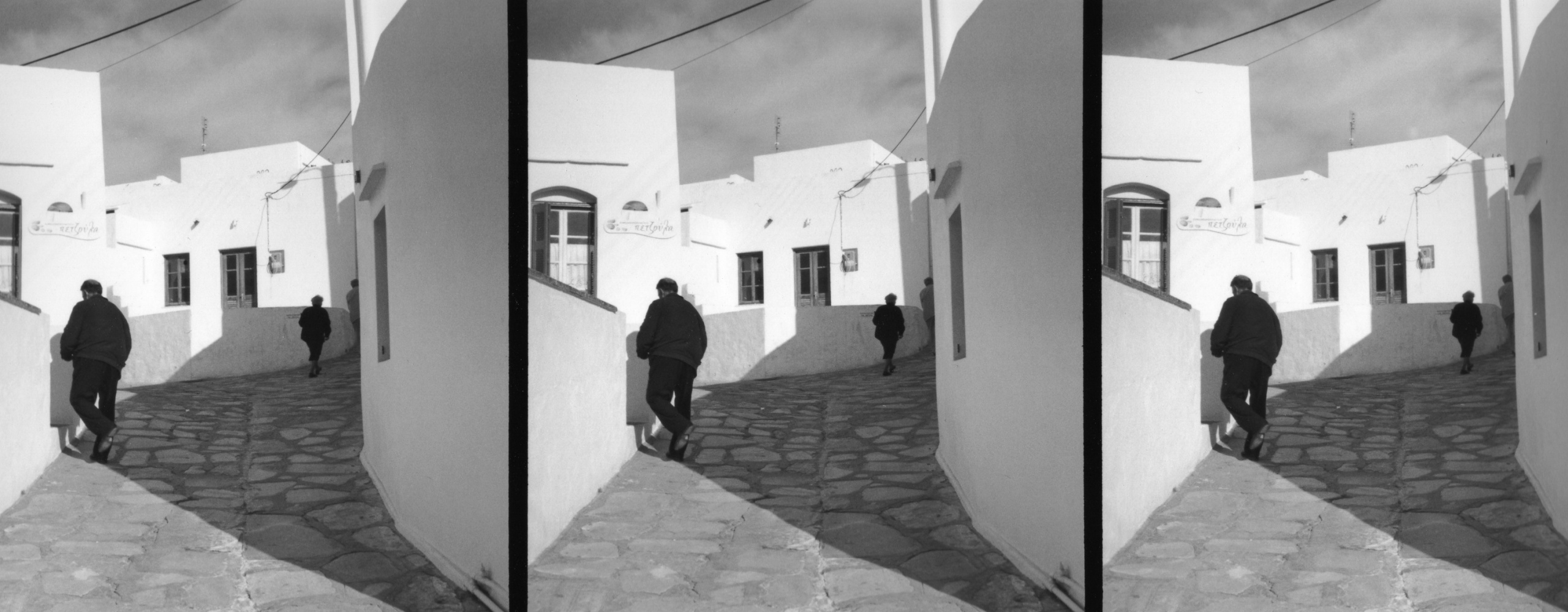     Jim Blomfield, People on Street, 2008, silver gelatin, 7 x 17.5 inches

