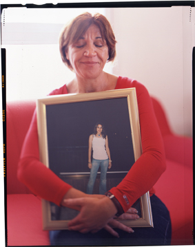     Jason Schwartz, Nava Siboni with photo of daughter Liron, age 19, 2006
