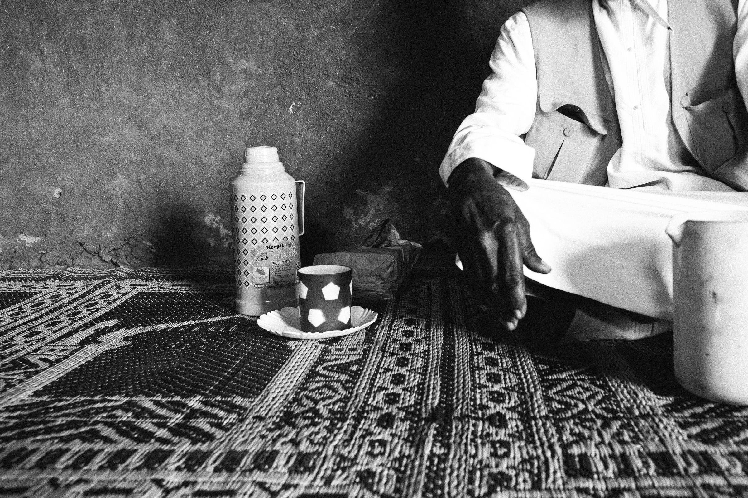     Leyla Jeyte, man sitting beside thermos and cup, 2016. Courtesy of the artist

