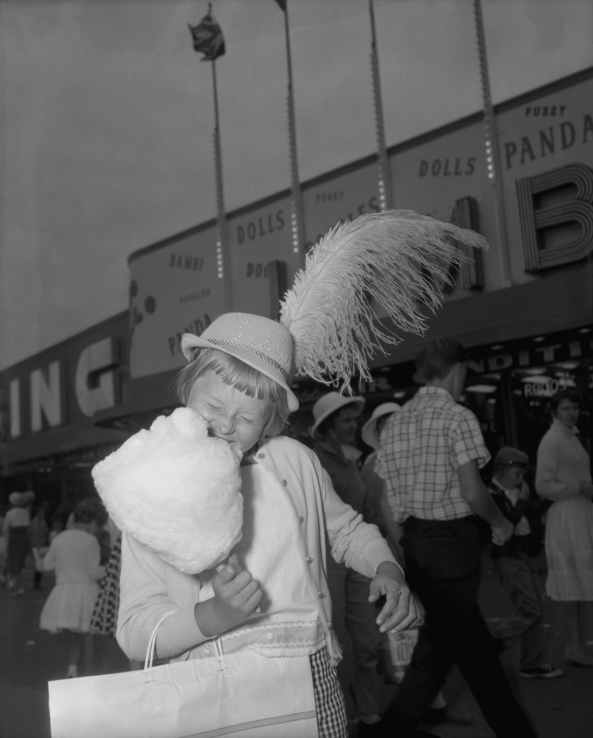 Child Eating Cotton Candy, 1961. Canadian National Exhibition Archives, MG5-F525-I4. Courtesy of the CNEA