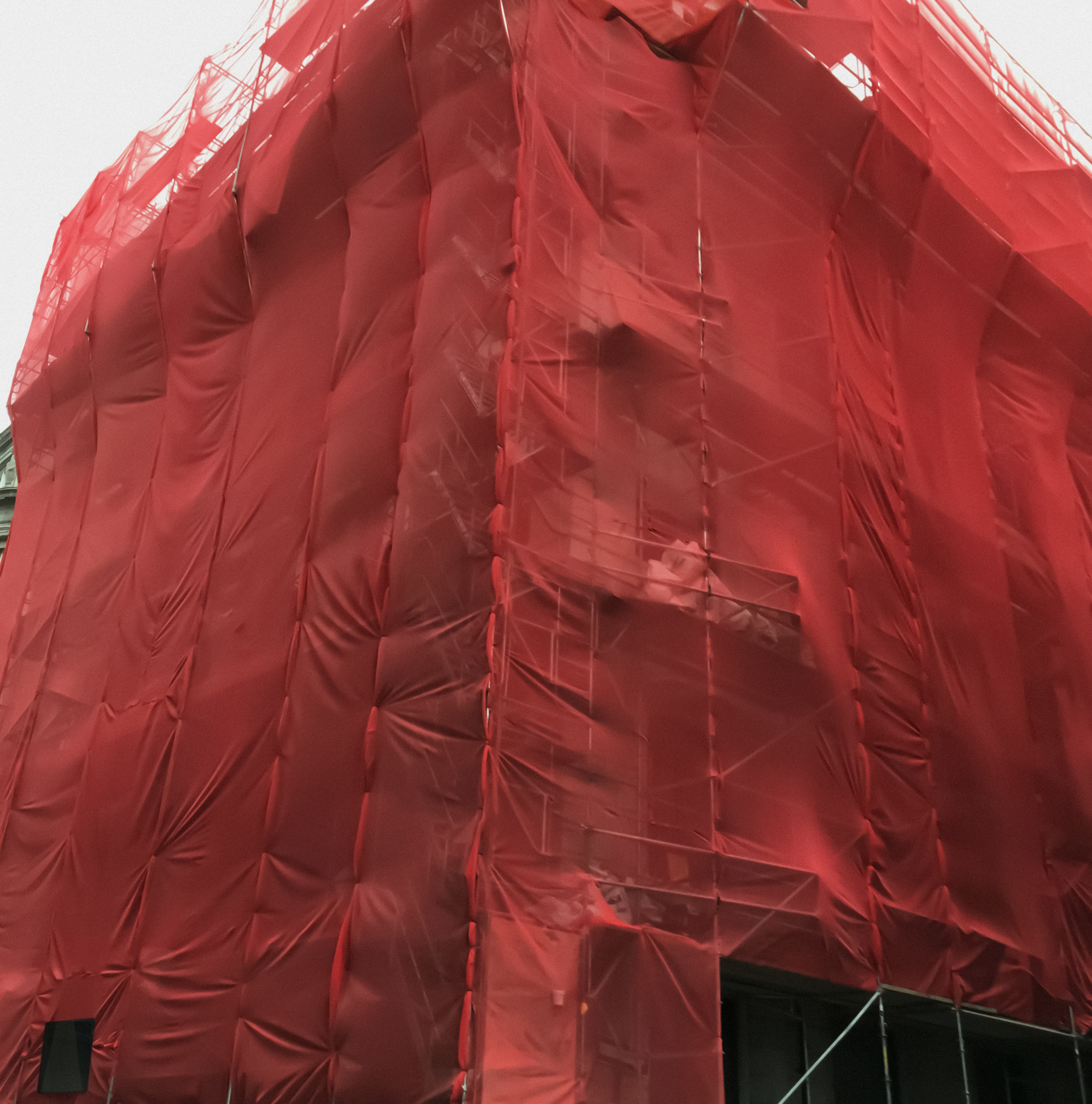 Angela Grauerholz, Building Covered in Red, 2022. Courtesy of the artist and Olga Korper Gallery