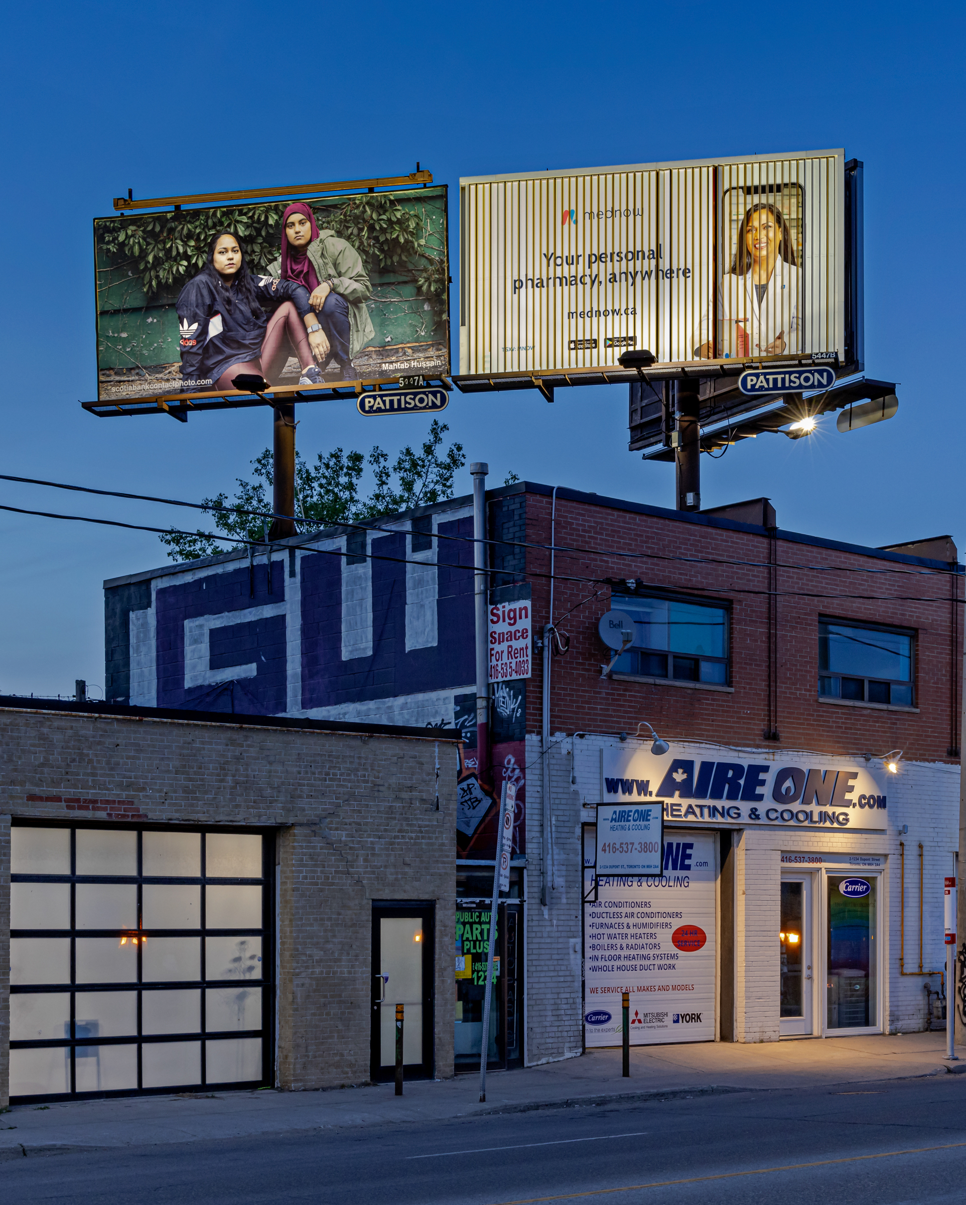     Mahtab Hussain, Tajvin Kazi and Rishada Majeed, 2021, from the series Muslims in America (ongoing). Billboard installation on Dupont St near Dufferin St, Toronto, 2022. © Mahtab Hussain, courtesy of the artist, Chris Boot, and CONTACT. Photo: Toni Hafkenscheid

