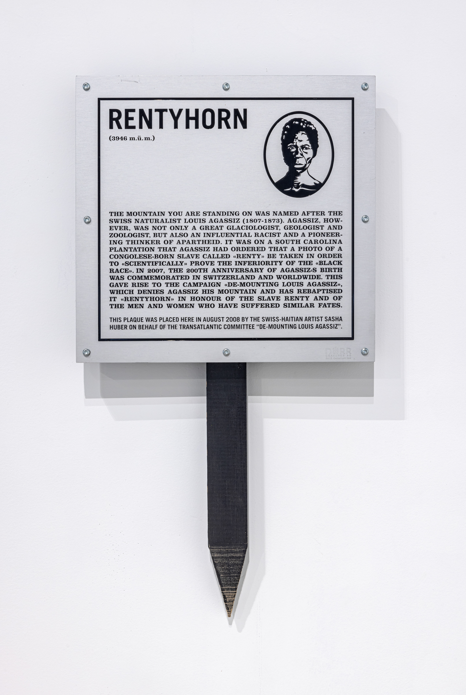     Sasha Huber, YOU NAME IT, installation view (&#8220;Metal Plaque,&#8221; 2008. Collection of the Museum of Contemporary Art Kiasma), The Power Plant Contemporary Art Gallery, 2022. Courtesy of the artist and The Power plant. Photo: Toni Hafkenscheid

