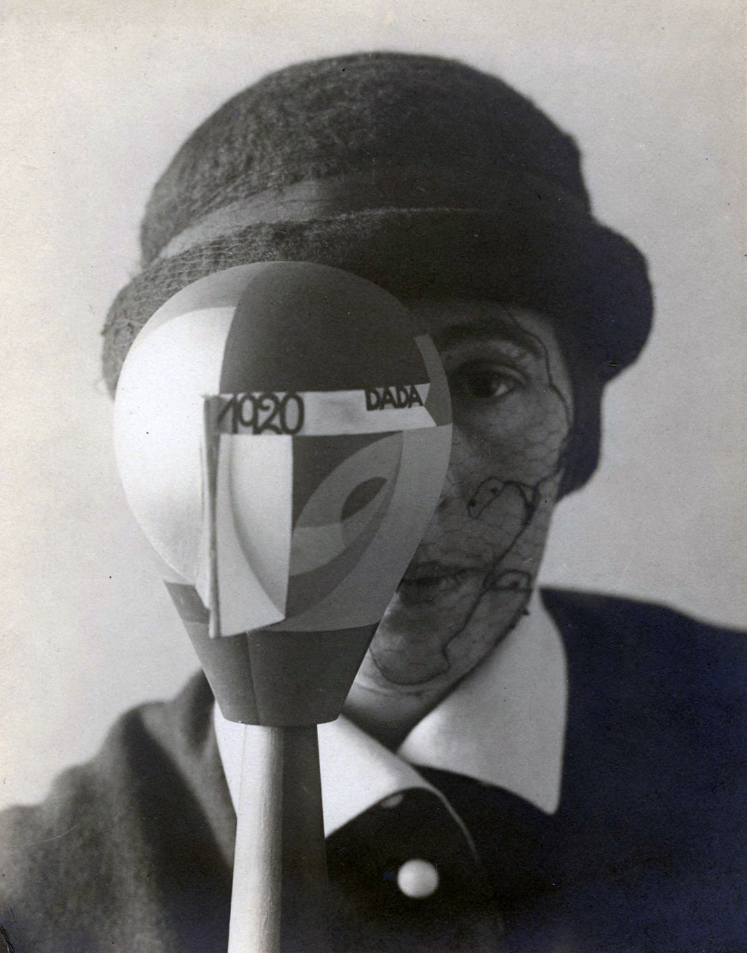 Sophie Taeuber-Arp, Sophie Taeuber-Arp derrière sa tête Dada (Sophie Taeuber-Arp behind her Dada head), 1920. Courtesy of Corkin Gallery