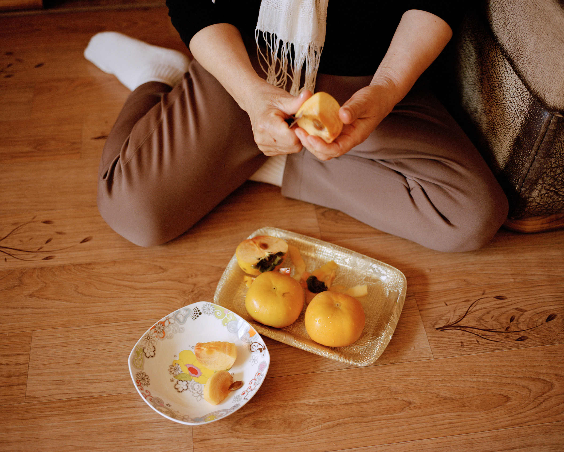 Janice Chung, Cutting Fruit, 2014. From the series Please Come Back Soon. Courtesy of the artist